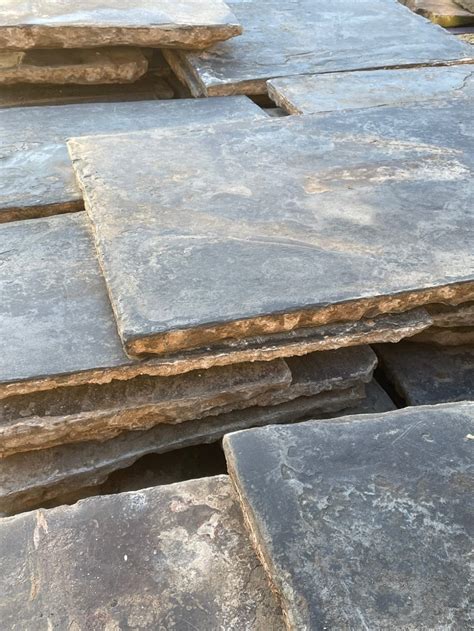Flagstone is available on pallets and in stock year around. The material is sold by the ton, and is available in quantities down to 1lb. We accommodate jobs of all sizes. We are open to the public and have qualified contractor programs available. Material can be picked up at our yard or delivery service is available for an additional fee. 